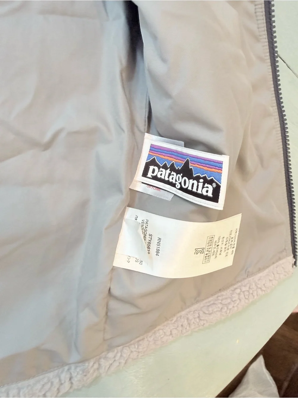 Patagonia Cream Sherpa Fleece Vest with Dark Trim